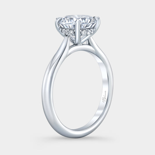 Platinum diamond ring on hand, round halo.