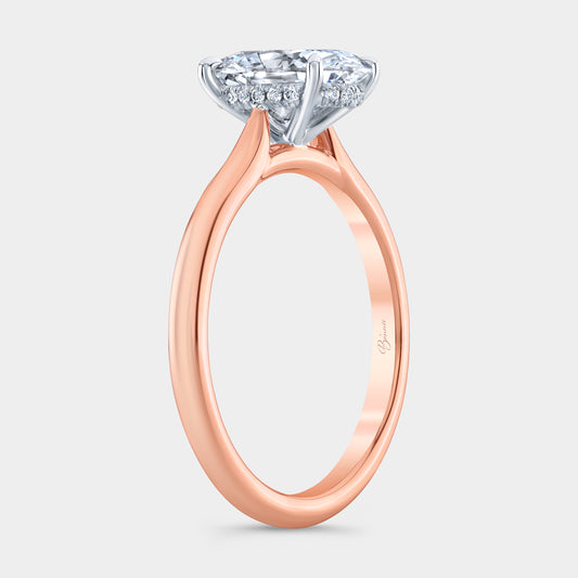 Two tone diamond ring on hand, oval halo.