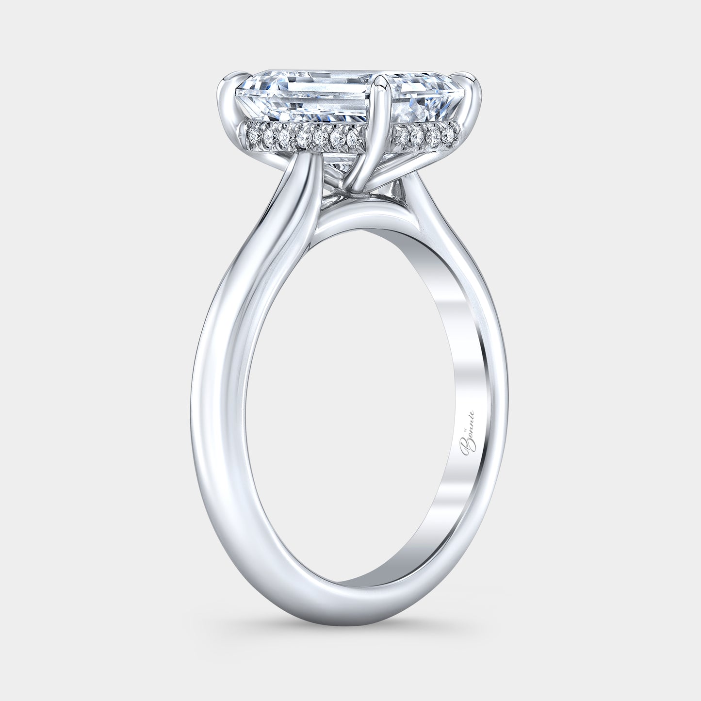 Emerald diamond ring, hidden halo and cathedral view.