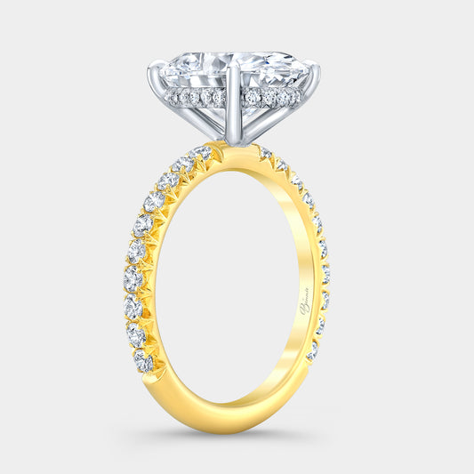 Two tone diamond ring on hand, oval halo.