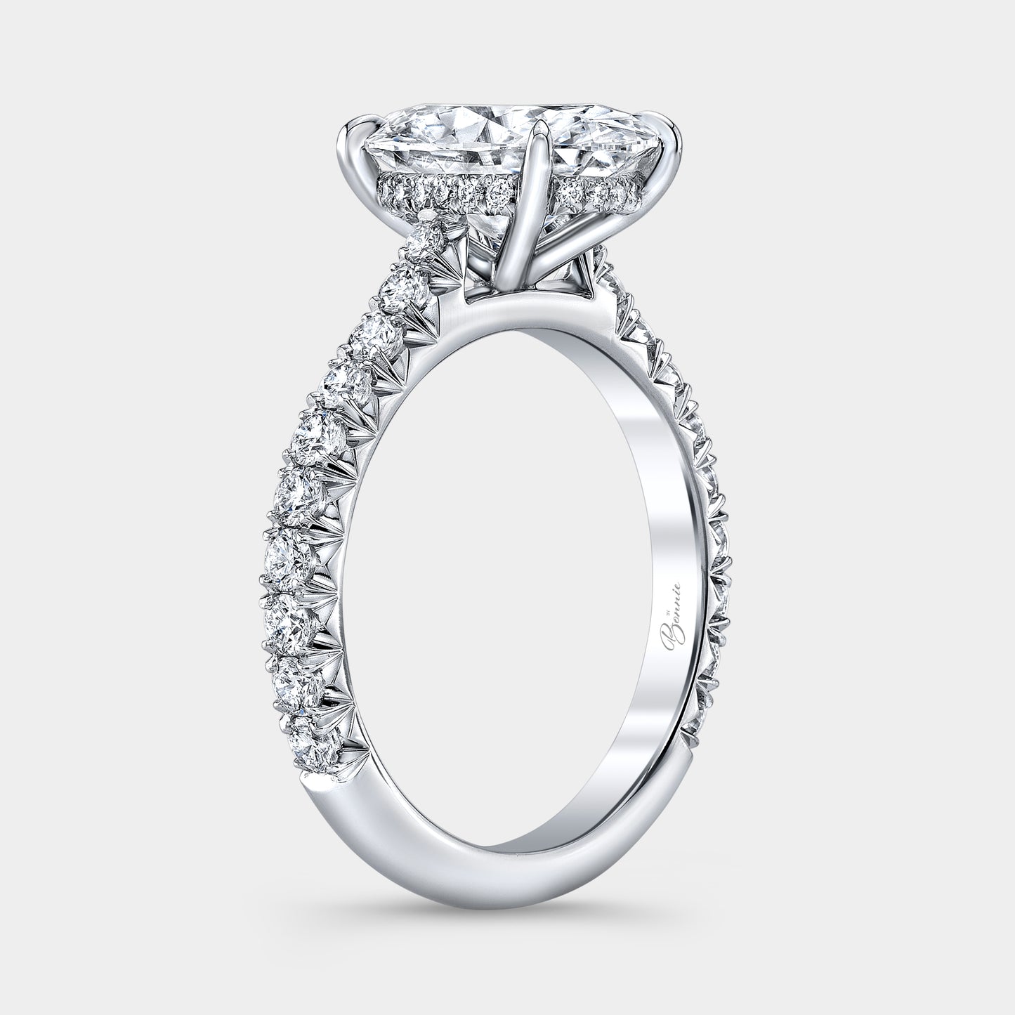 2ct oval diamond engagement ring, cathedral setting.
