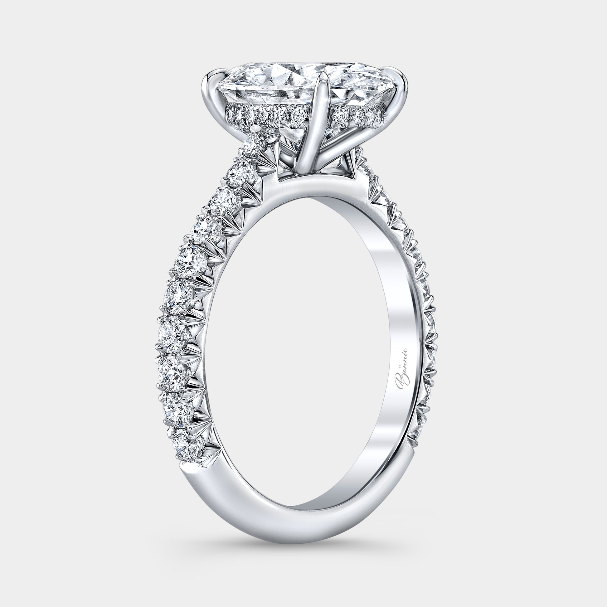 2ct oval diamond engagement ring, cathedral setting.