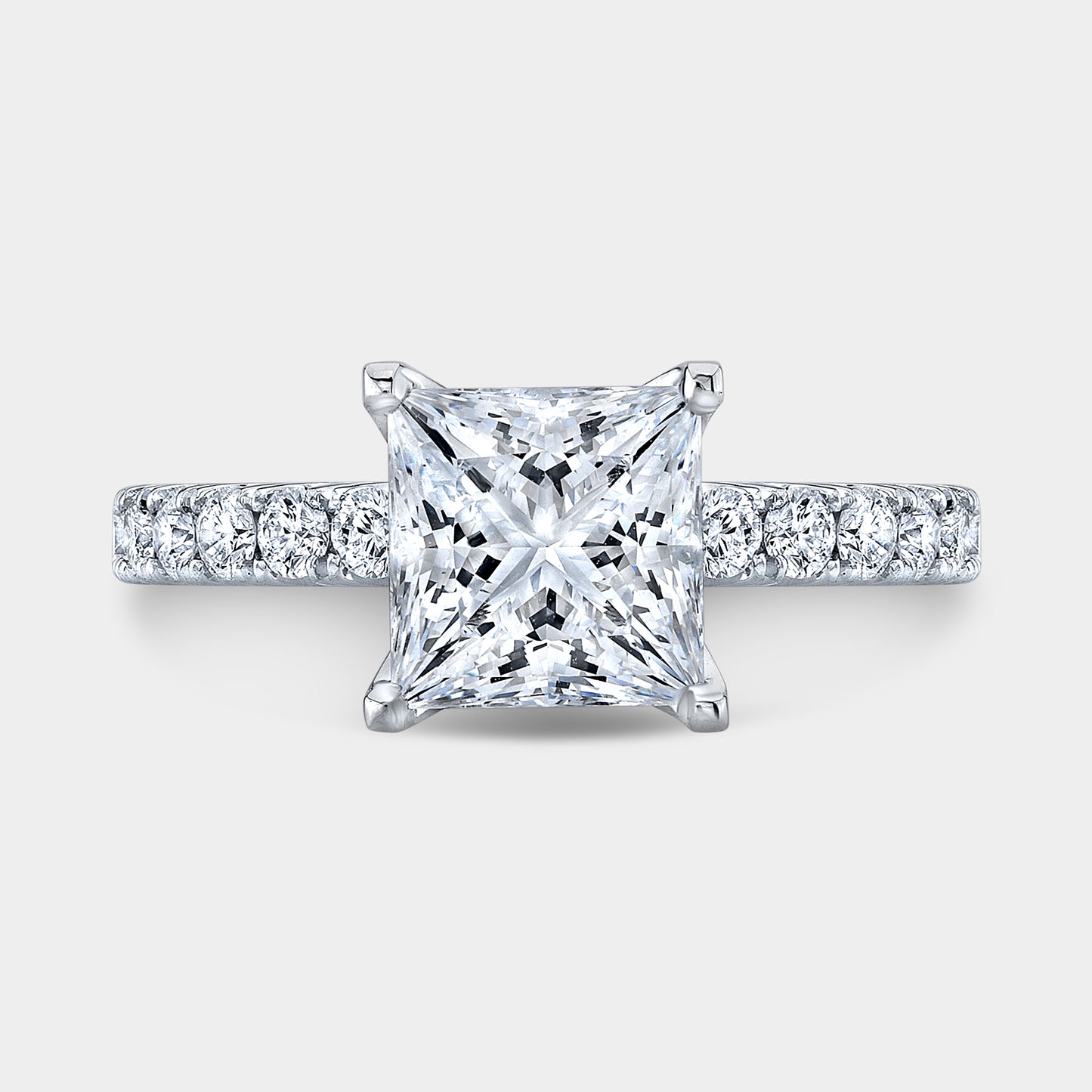 Platinum princess diamond ring, top view, pave.