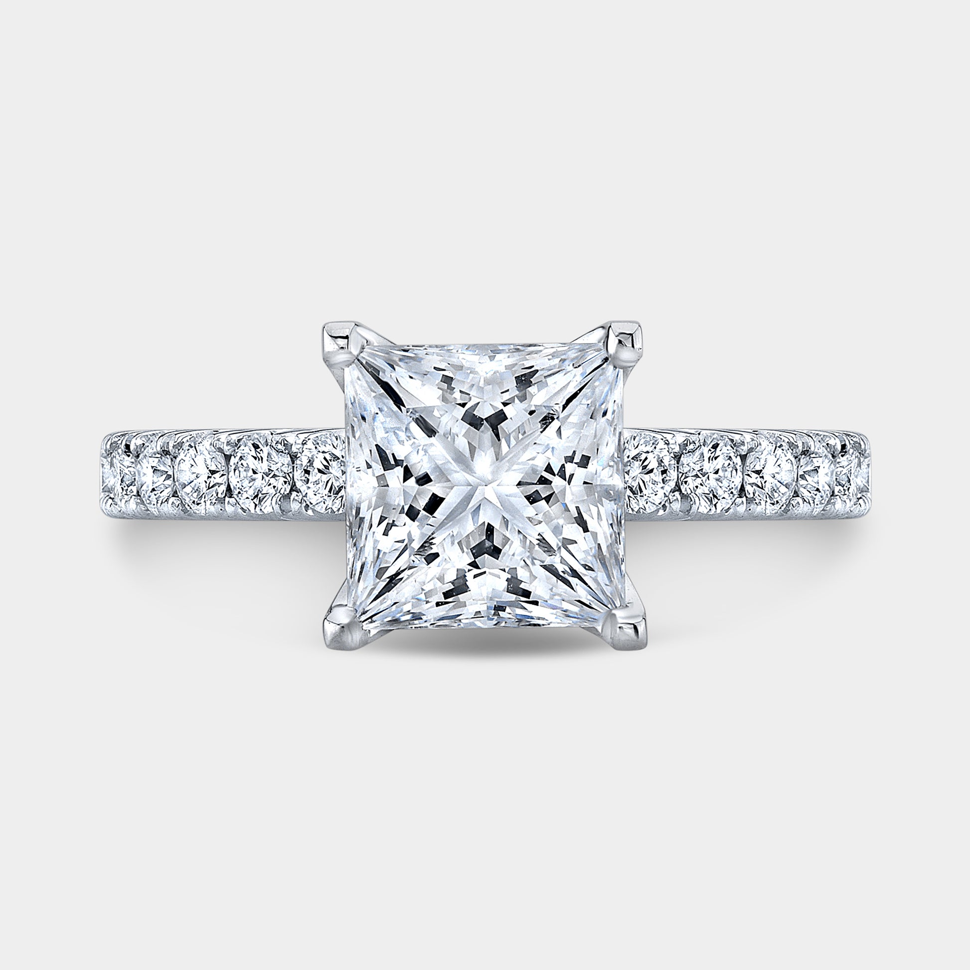 Platinum princess diamond ring, top view, pave.