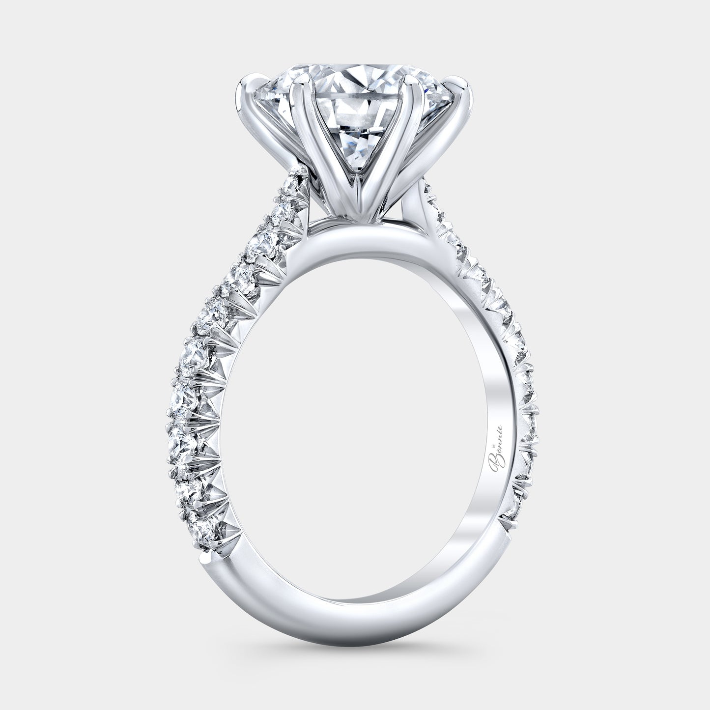 Platinum round diamond ring, 45 degree, cathedral.