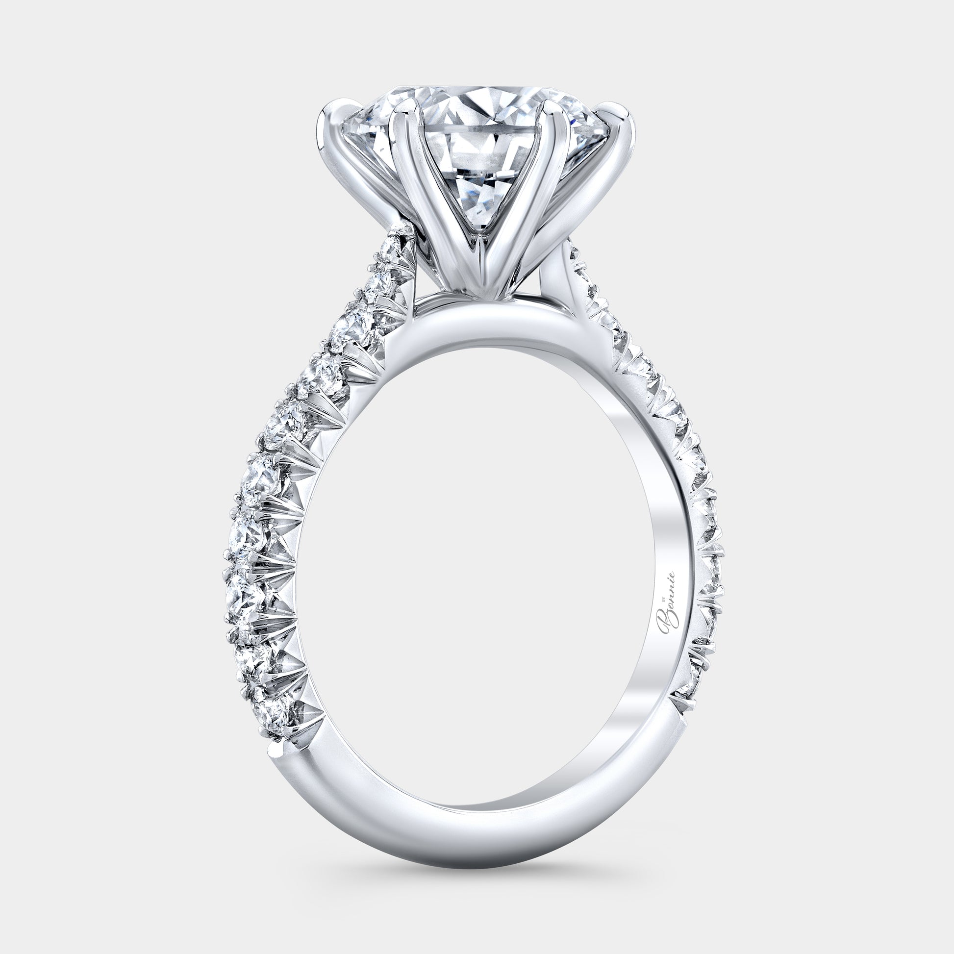 Platinum round diamond ring, 45 degree, cathedral.