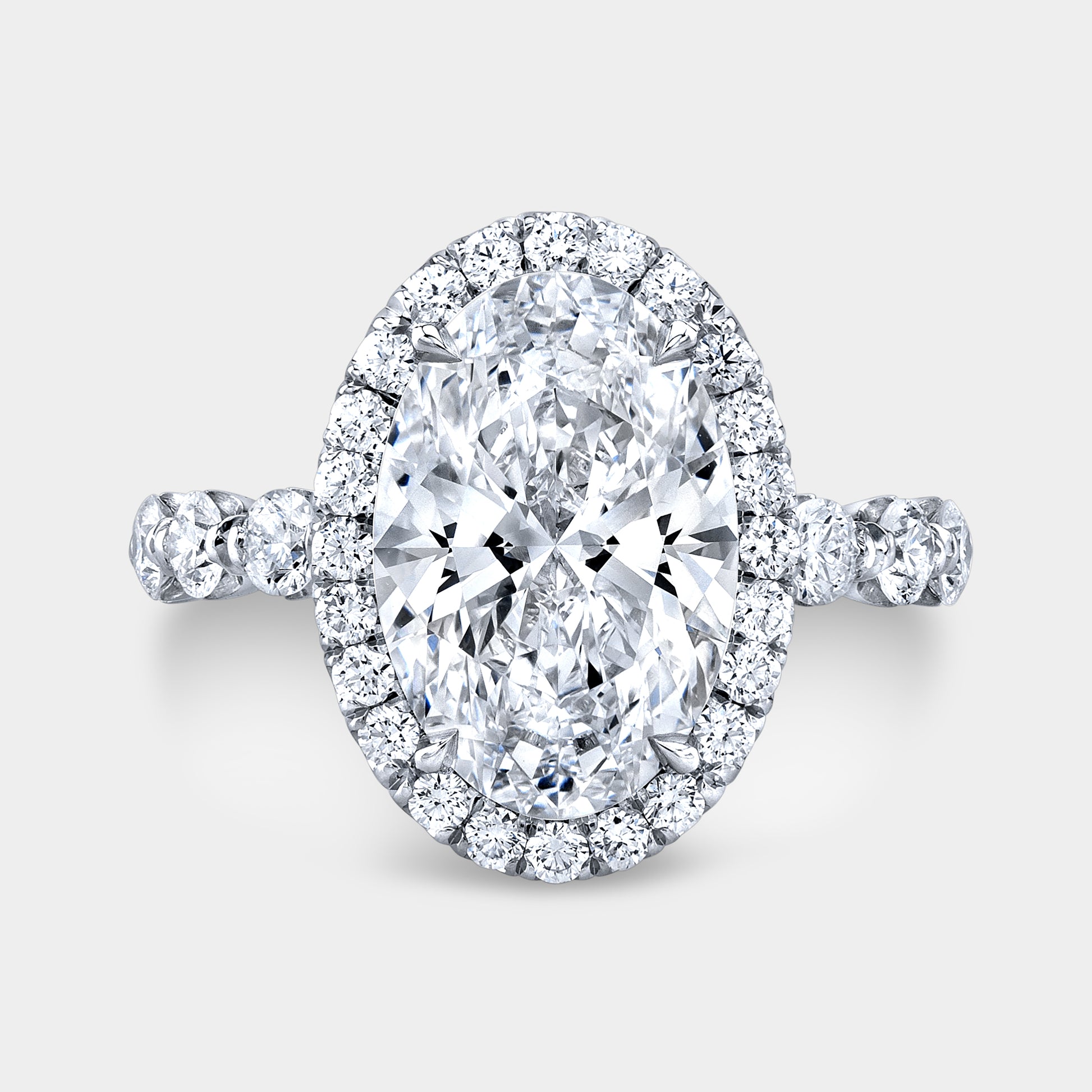 Ring, top-down angle, shared prong detail.