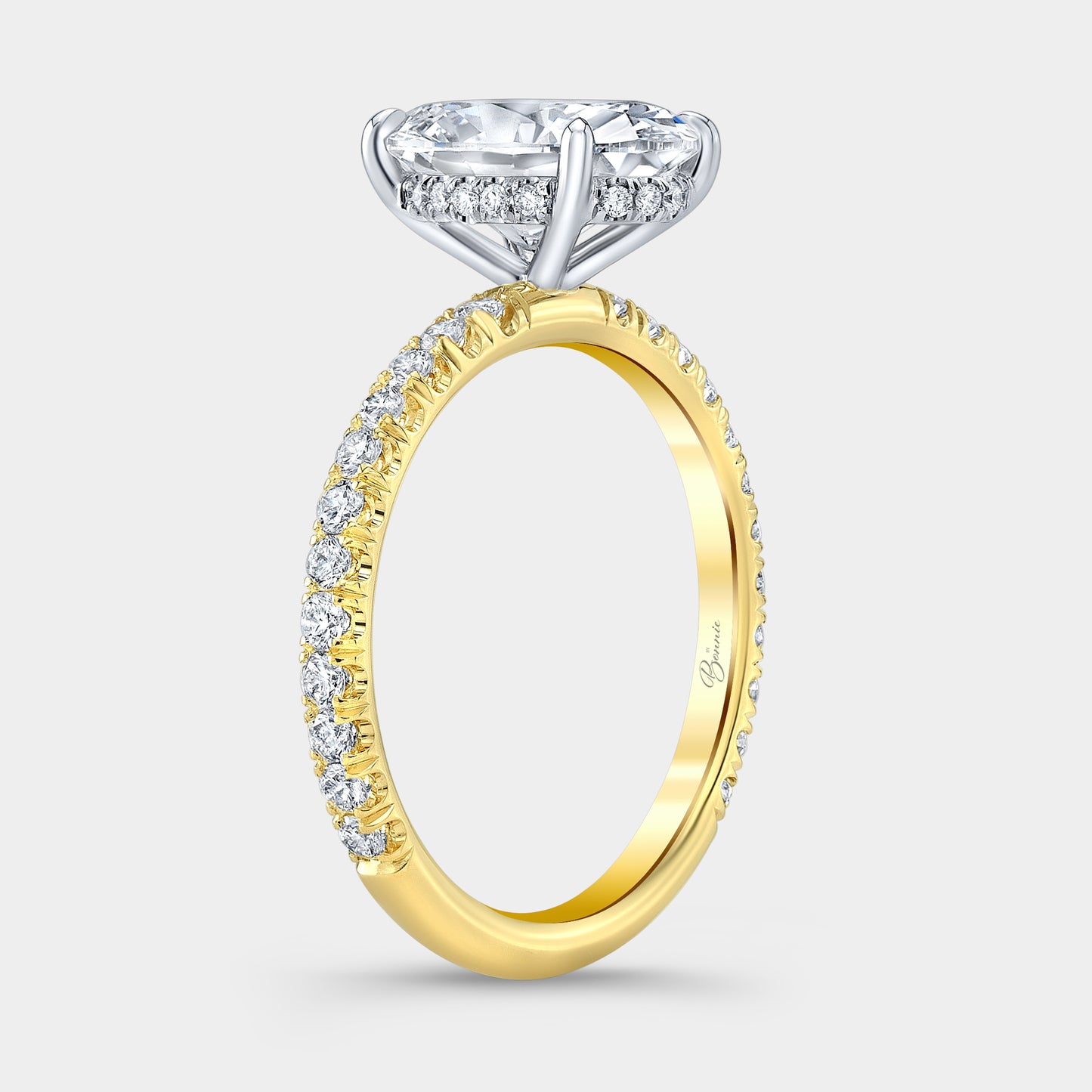 Two tone oval ring, 45 degree, hidden halo.