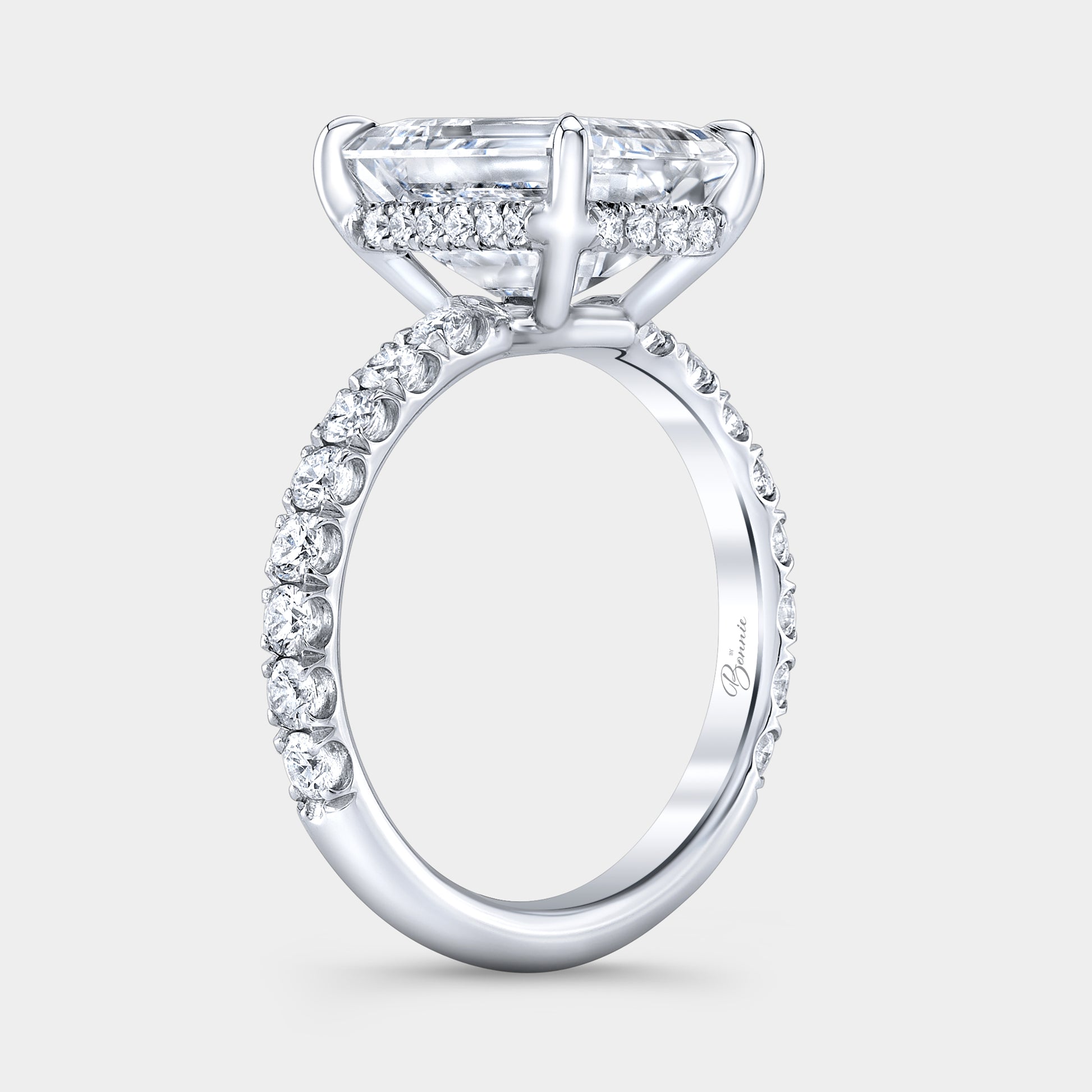 Emerald diamond ring, hidden halo and U pave view.