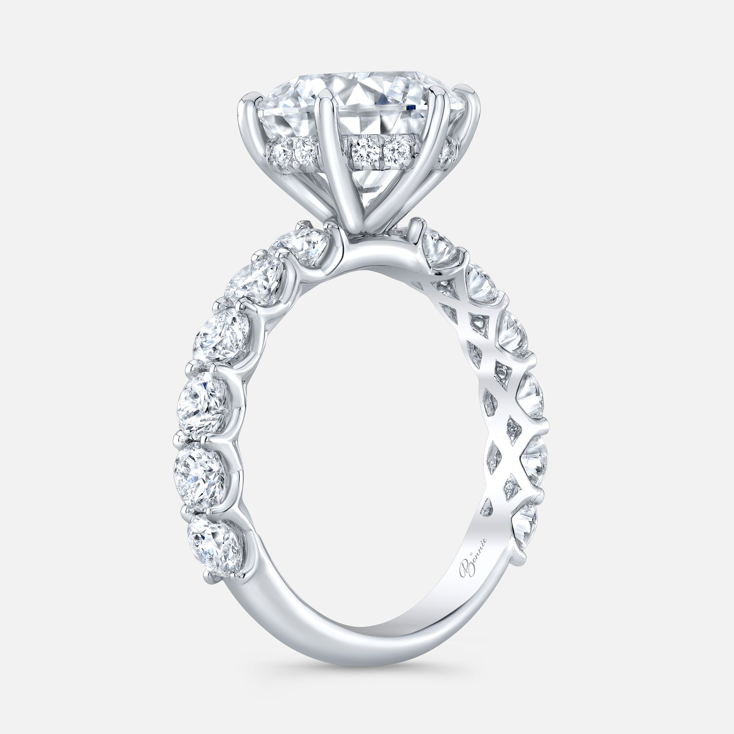 Round diamond Eloise ring, white gold band.