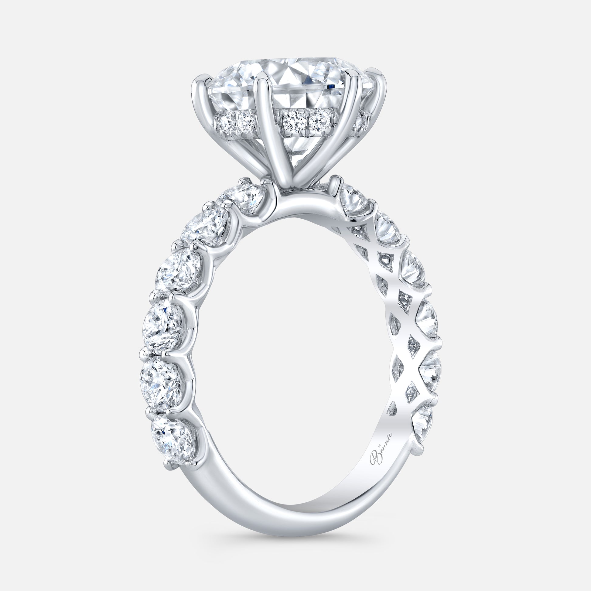 Round diamond Eloise ring, white gold band.