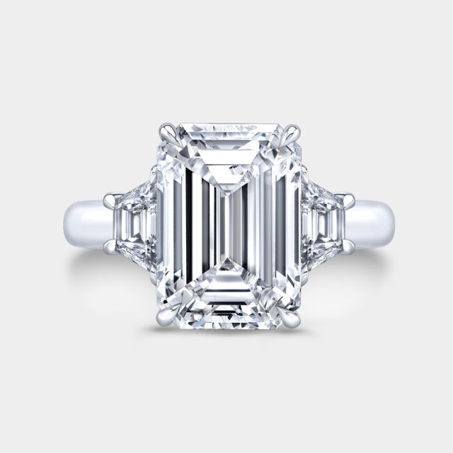 Emerald diamond ring, top down, 3 stone, trapezoids.