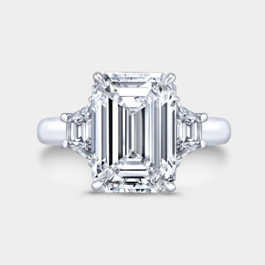 Emerald diamond ring, top down, 3 stone, trapezoids.