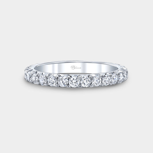 Platinum French pave diamond eternity band.