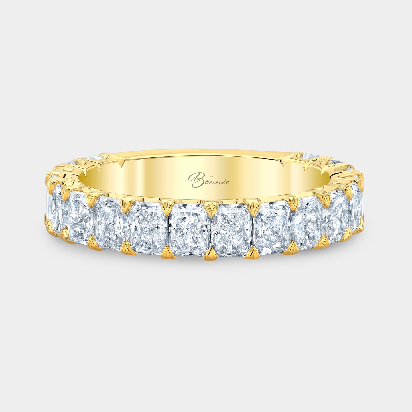 Yellow gold radiant diamond wedding band, 3/4 way set.