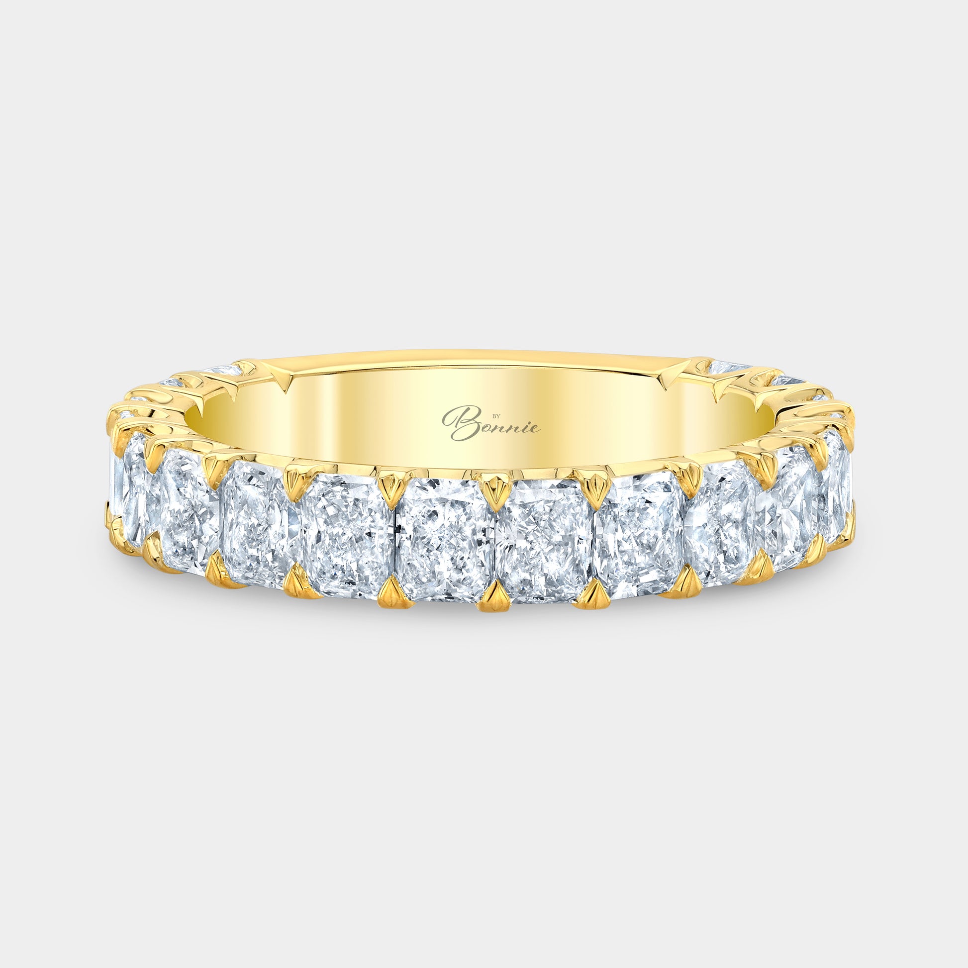 Yellow gold radiant diamond wedding band, 3/4 way set.