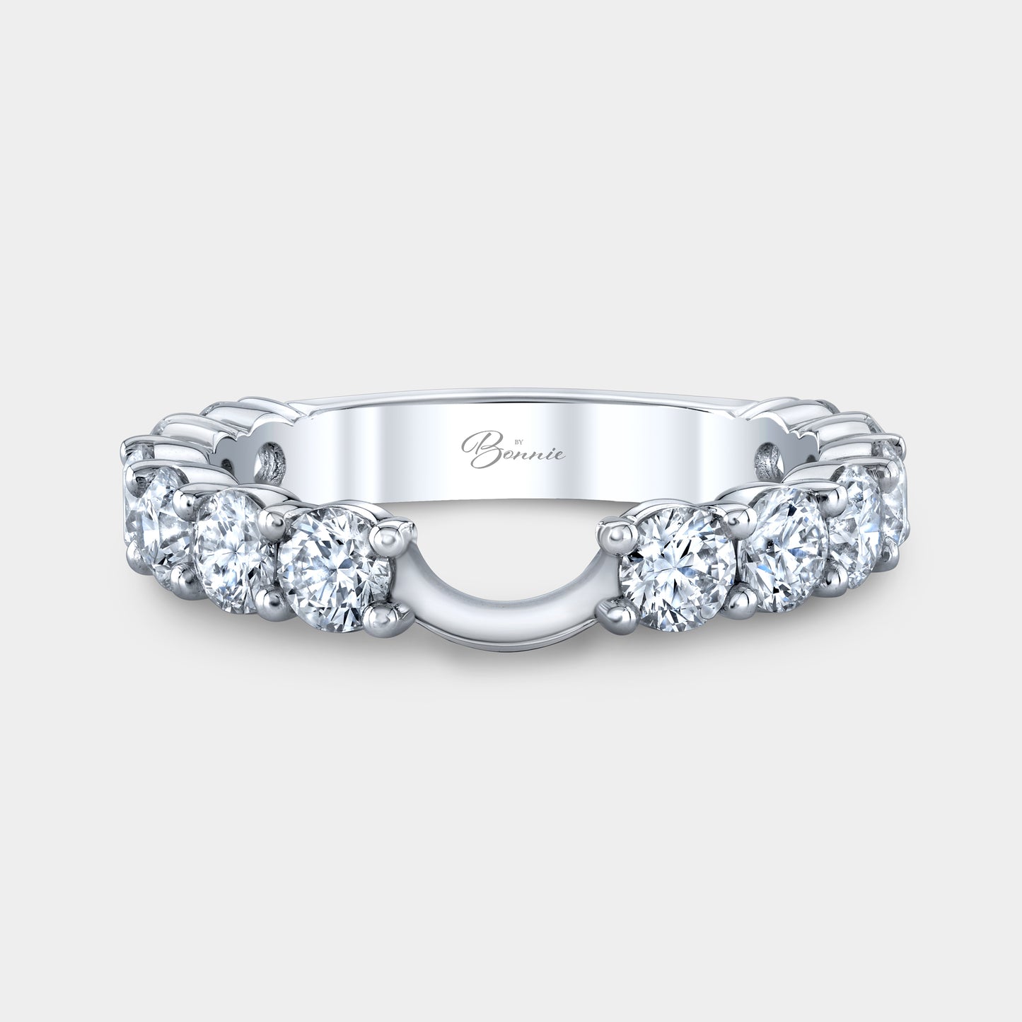 Platinum Sophia contour diamond band, shared prong.