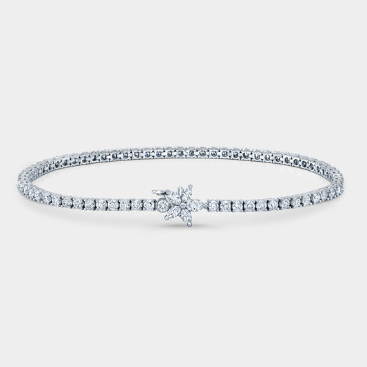 White gold tennis bracelet, marquise and round diamonds.