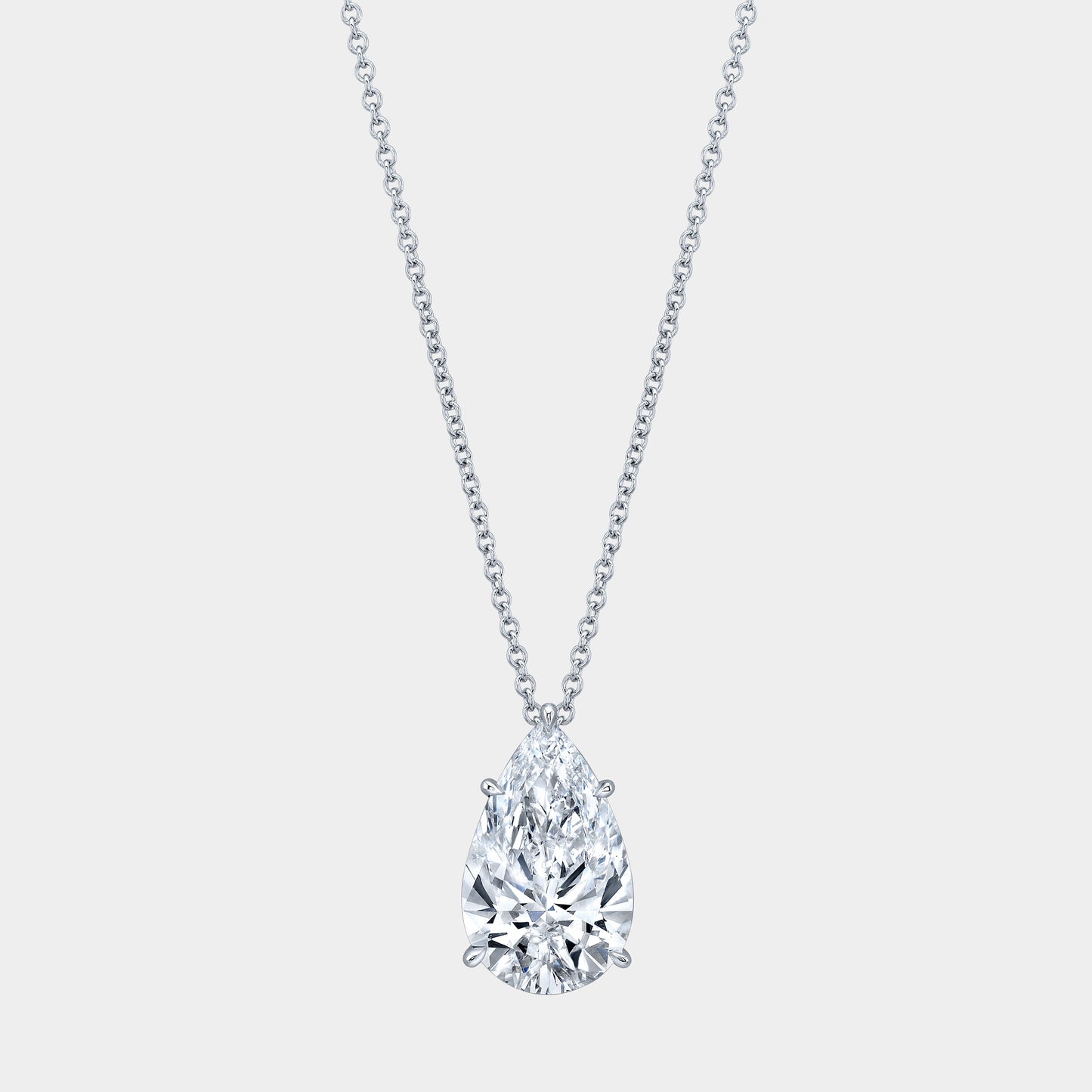 White gold necklace, pear diamond pendant, solitaire setting.