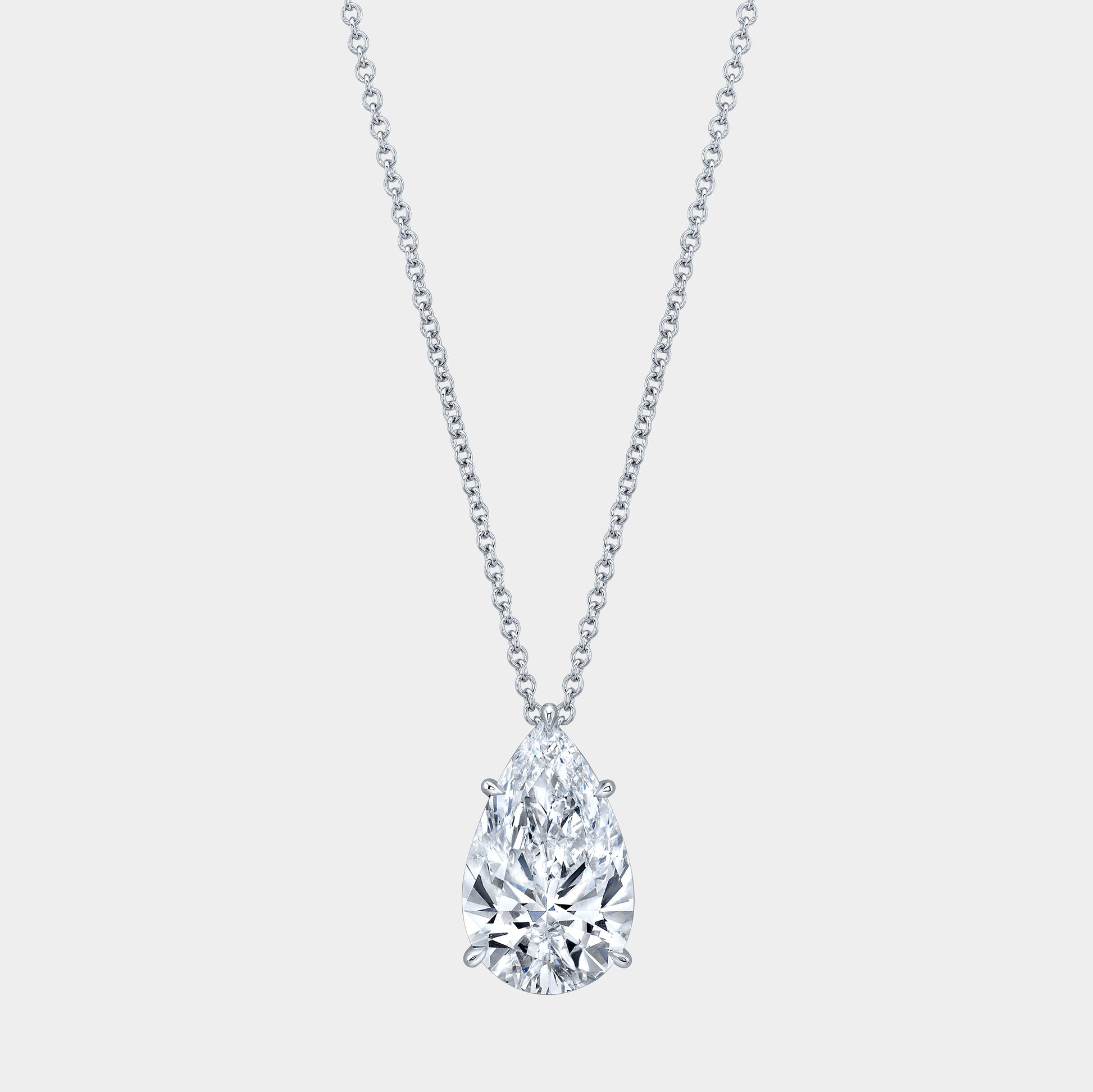 White gold necklace, pear diamond pendant, solitaire setting.