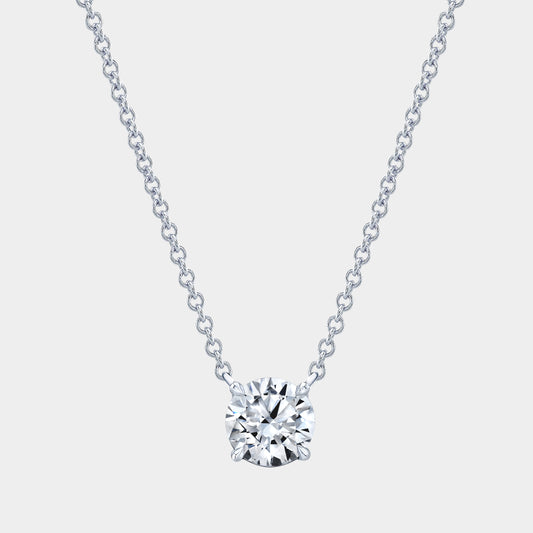 Platinum necklace, round diamond pendant, 4 prong basket setting.