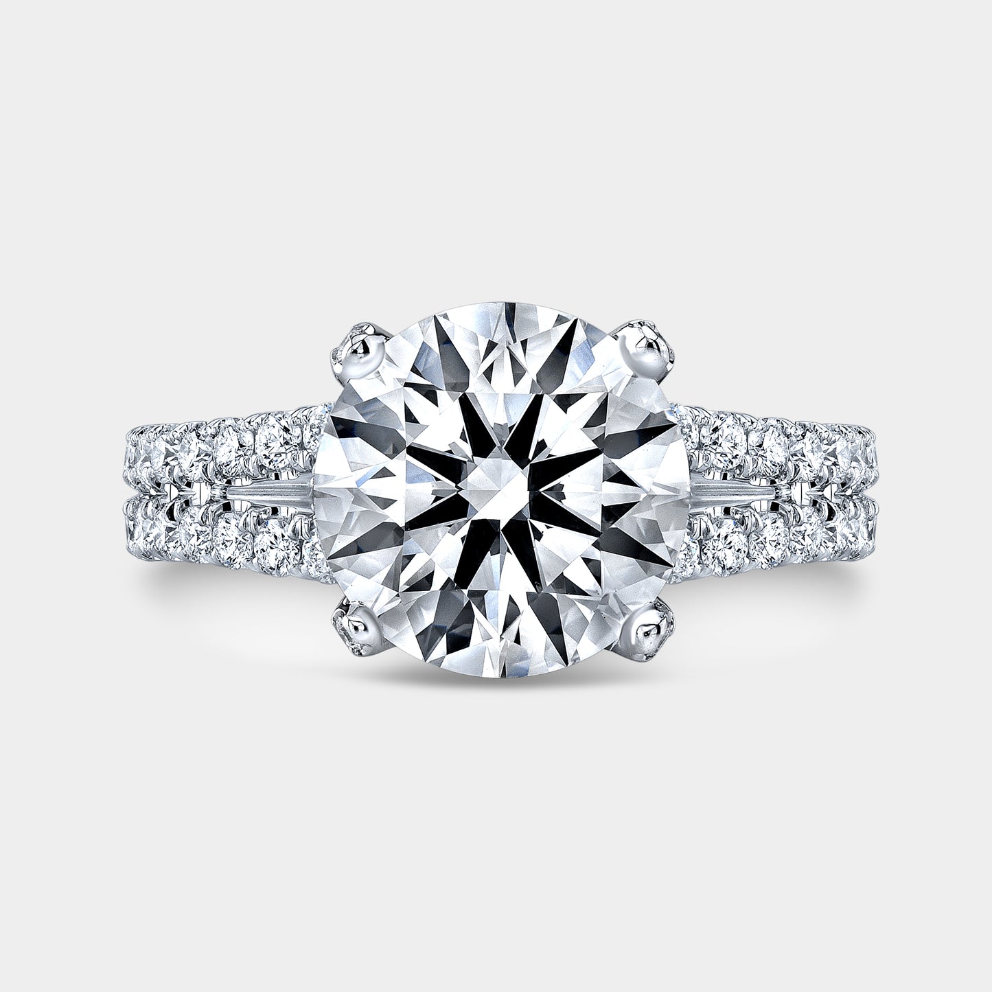 Round diamond ring, double row U pave setting view.