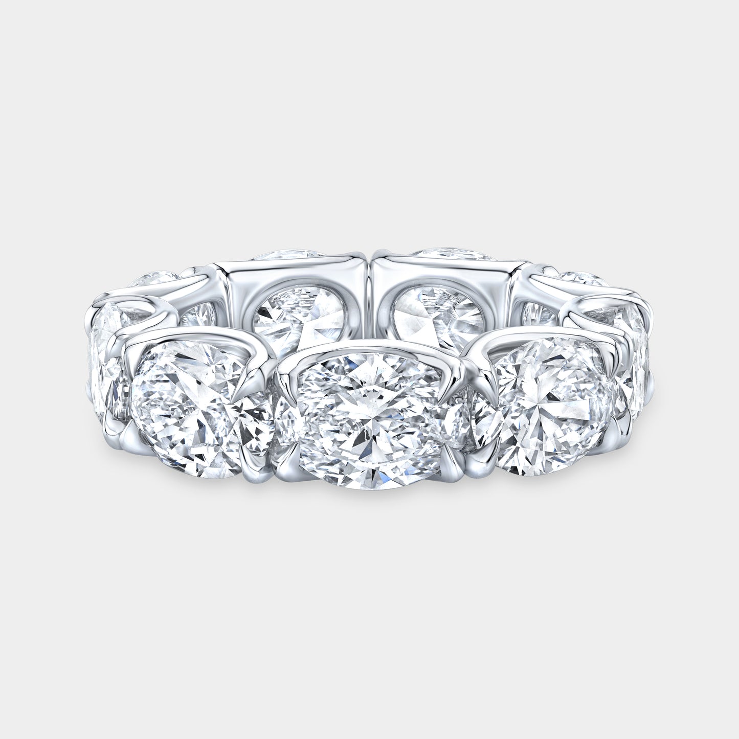 Platinum eternity band, oval diamonds, U gallery setting.
