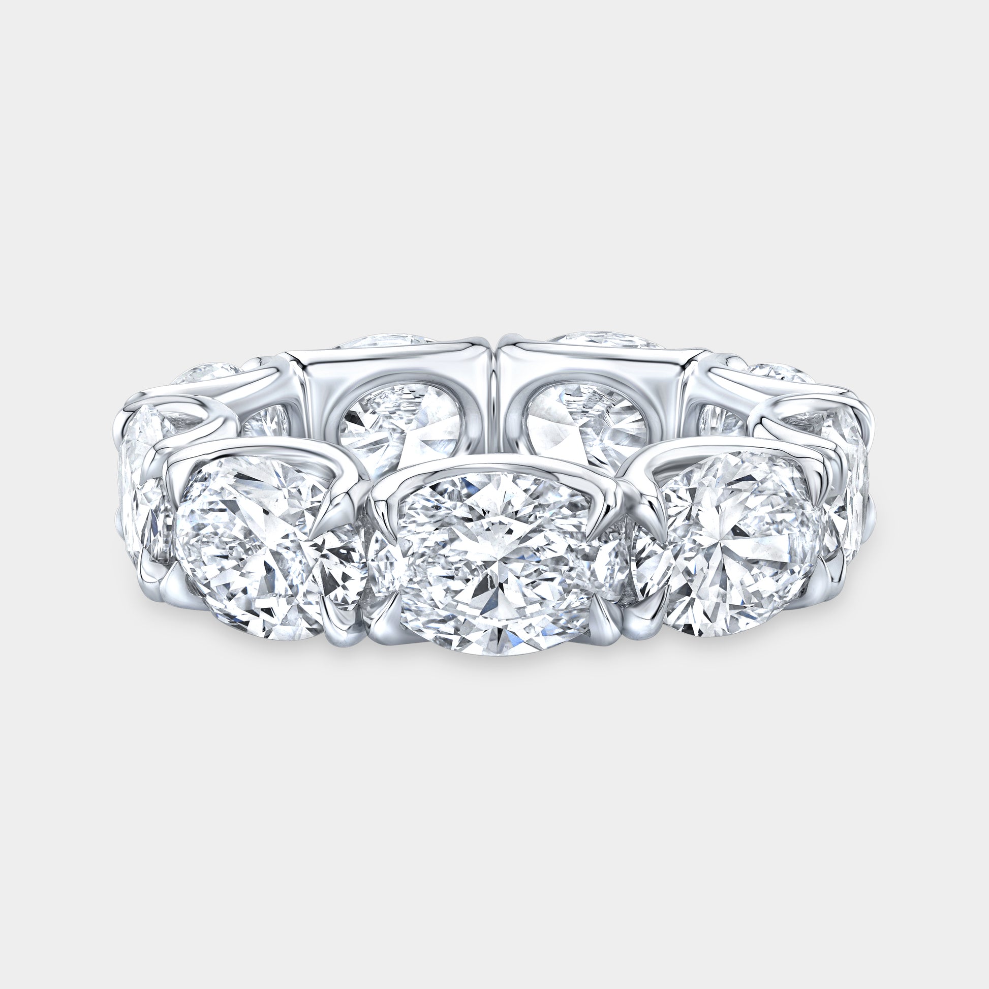 Platinum eternity band, oval diamonds, U gallery setting.