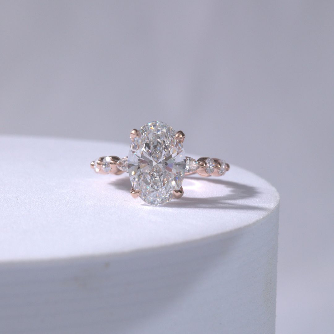 Oval Diamond Tulip With Full Diamond Basket with Round & Marquise Diamond Band Rose Gold Engagement Ring