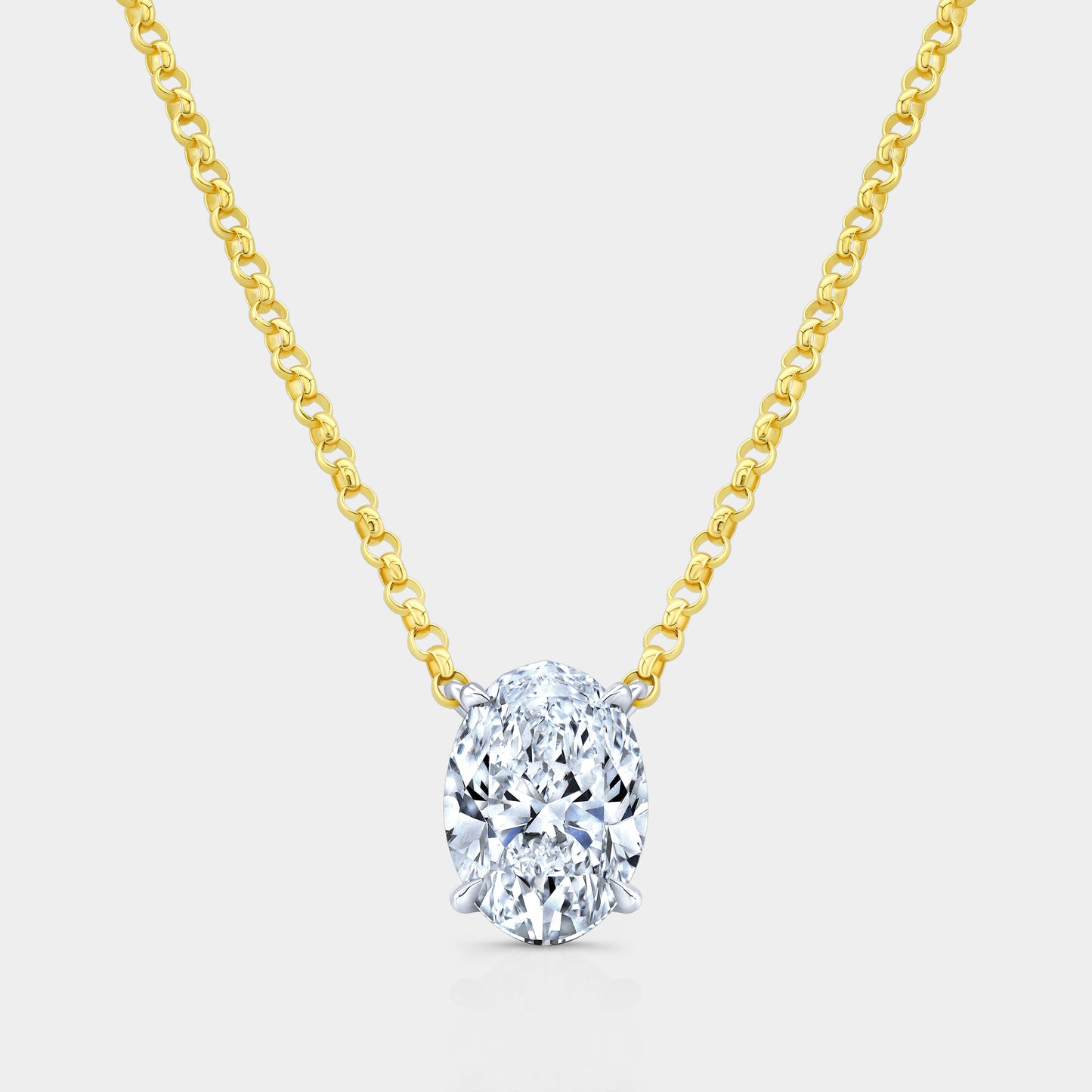 Oval diamond pendant, yellow gold chain.