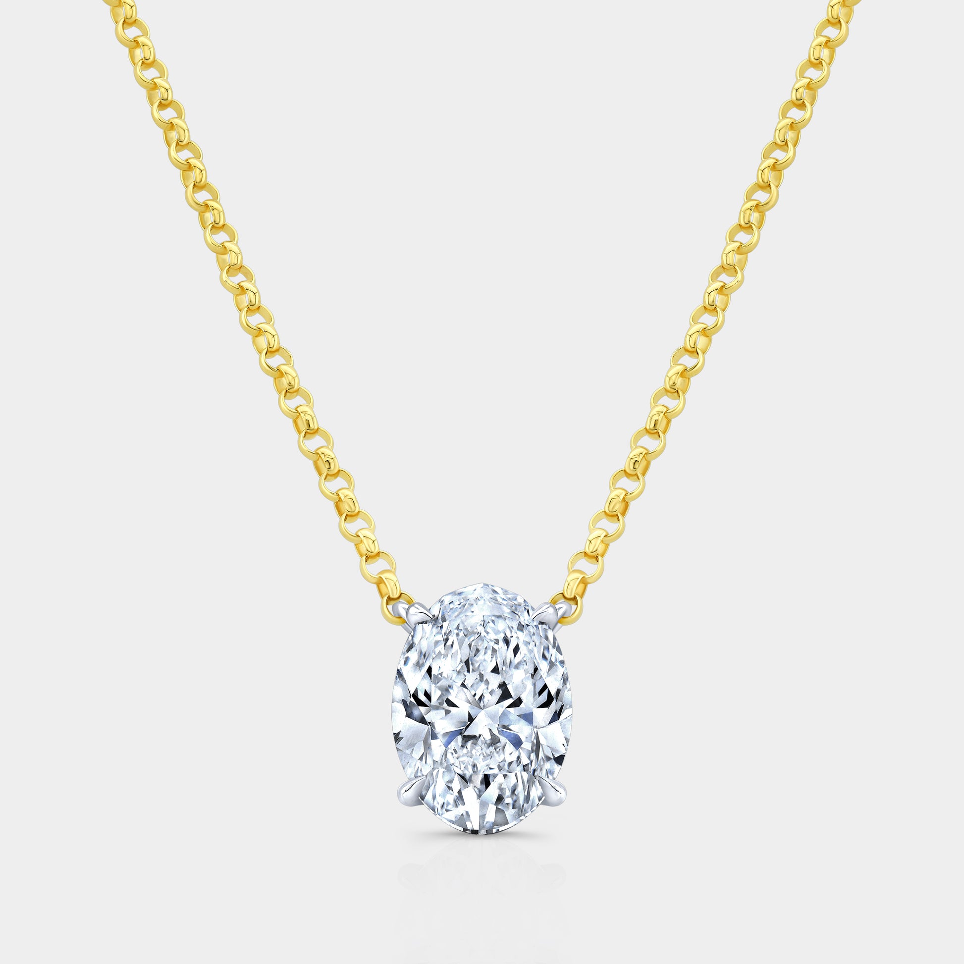 Oval diamond pendant, yellow gold chain.