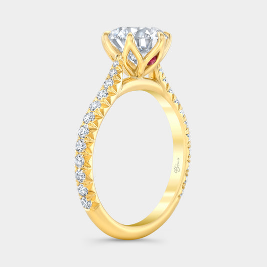 Yellow gold diamond ring on hand, round tulip pave.