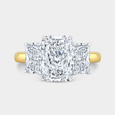 Radiant diamond 3 stone ring, yellow gold.