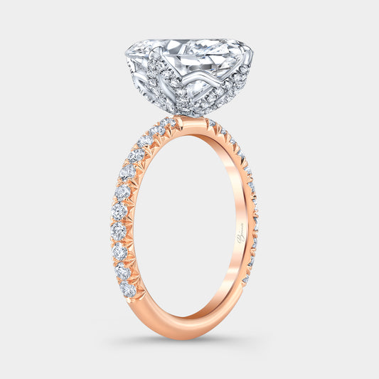 Two tone diamond ring on hand, oval tulip pave.