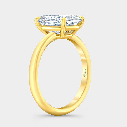 Oval diamond ring, gold band detail.