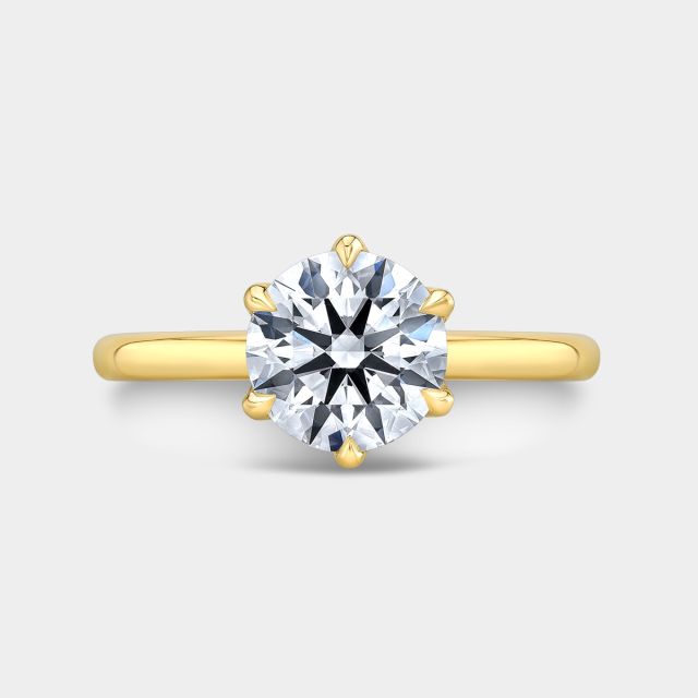 Yellow gold round ring, top view, tulip cathedral.