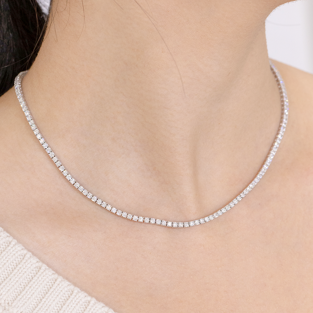 White gold choker with diamond tennis line.