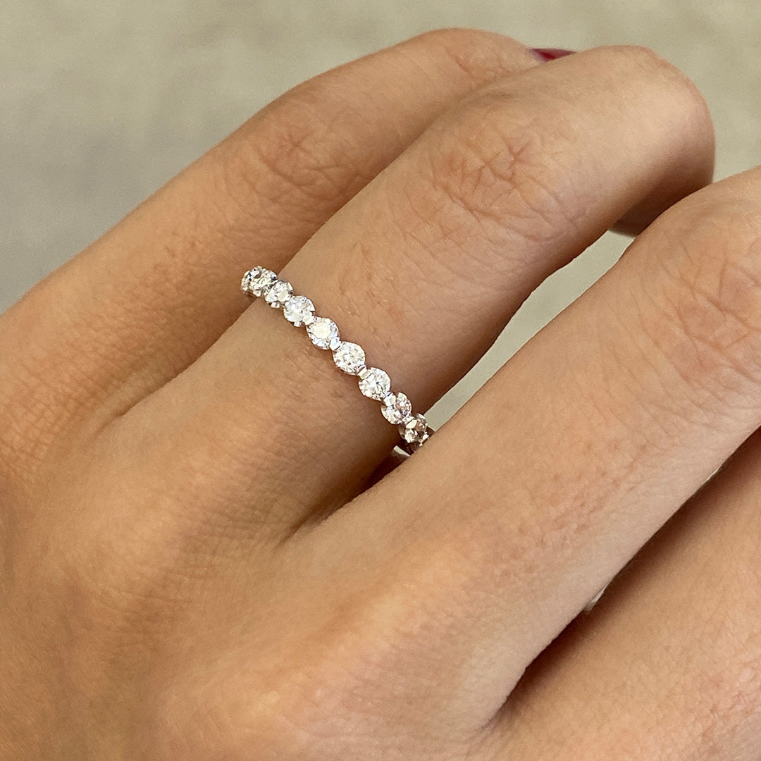 Petite Round Diamond Crown Cut Band on Hand, Platinum.