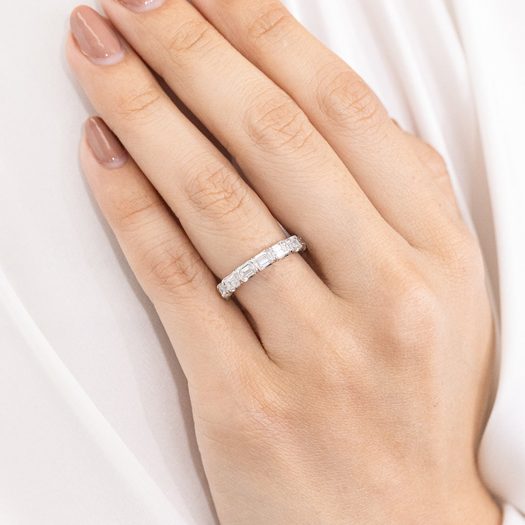 Emerald Diamond East West Band on Hand, Platinum.