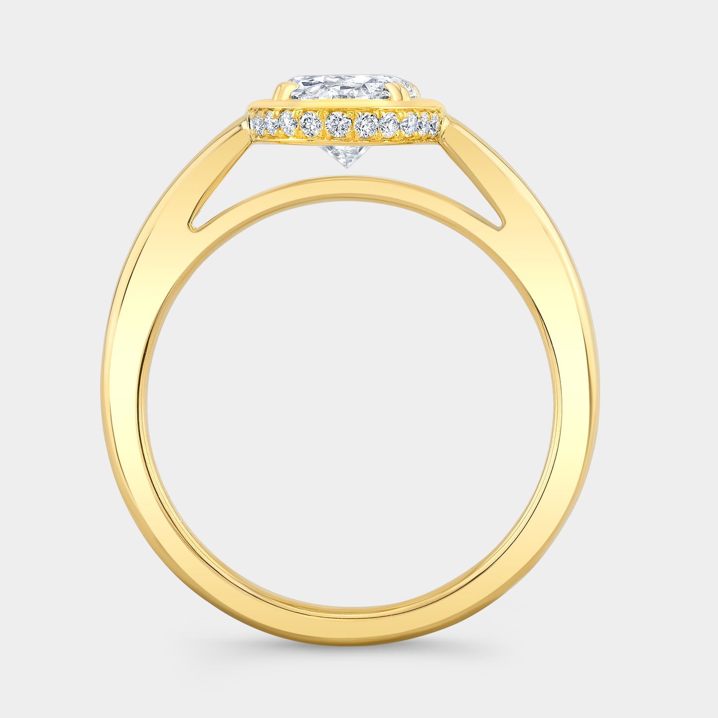 Yellow gold oval ring, Mira bezel, hidden halo, solitaire.