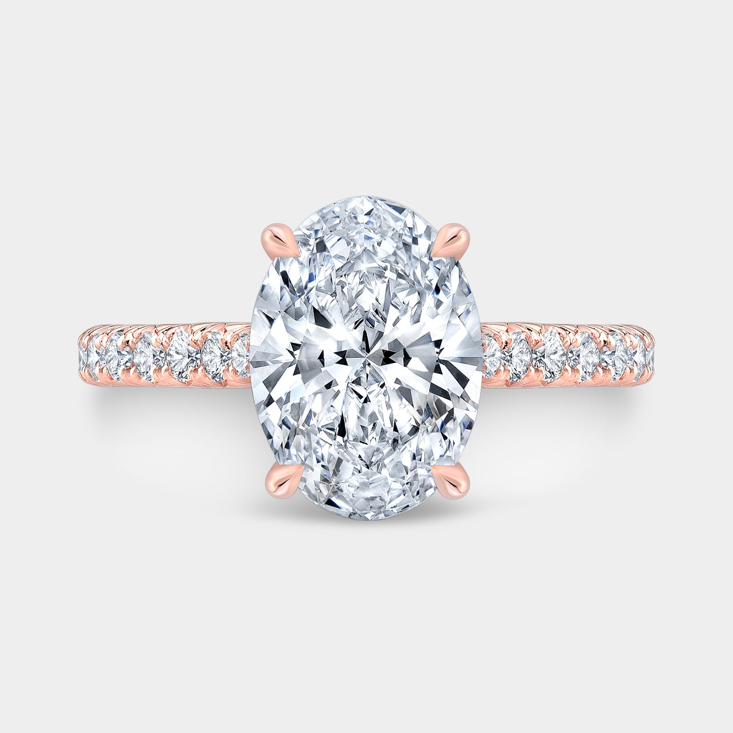 Oval ring, top down, halo, pave setting.