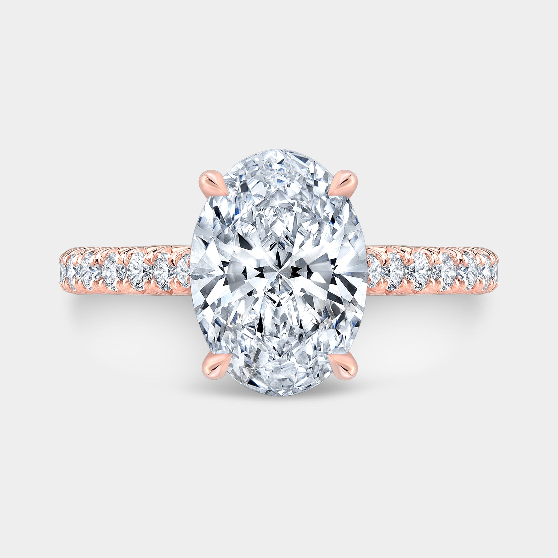 Oval ring, top down, halo, pave setting.