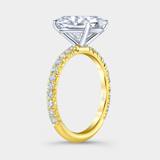 Two tone diamond ring on hand, pave setting.