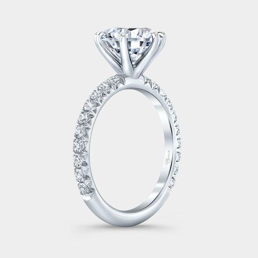 Platinum diamond ring on hand, pave setting.