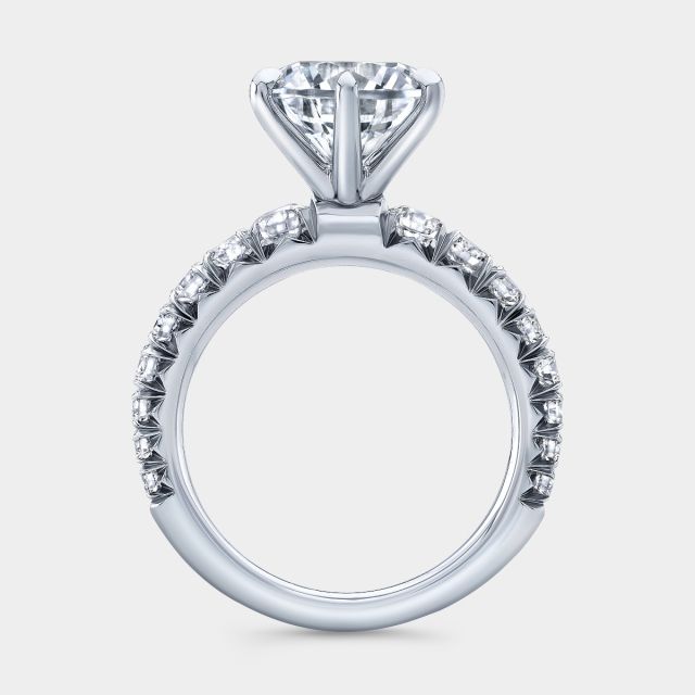 Platinum round diamond ring, graduating pave band.