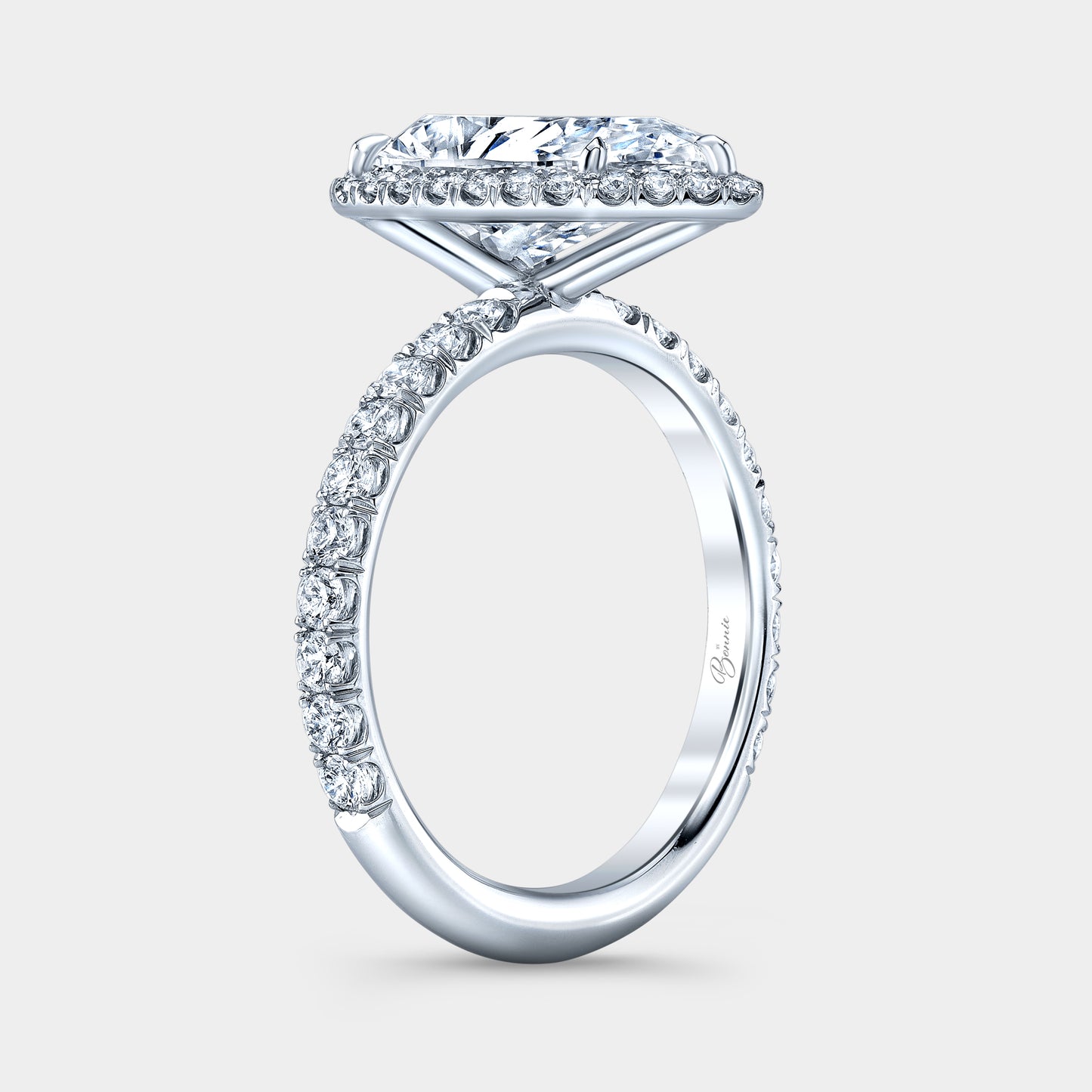 Pear diamond ring, halo and U pave view