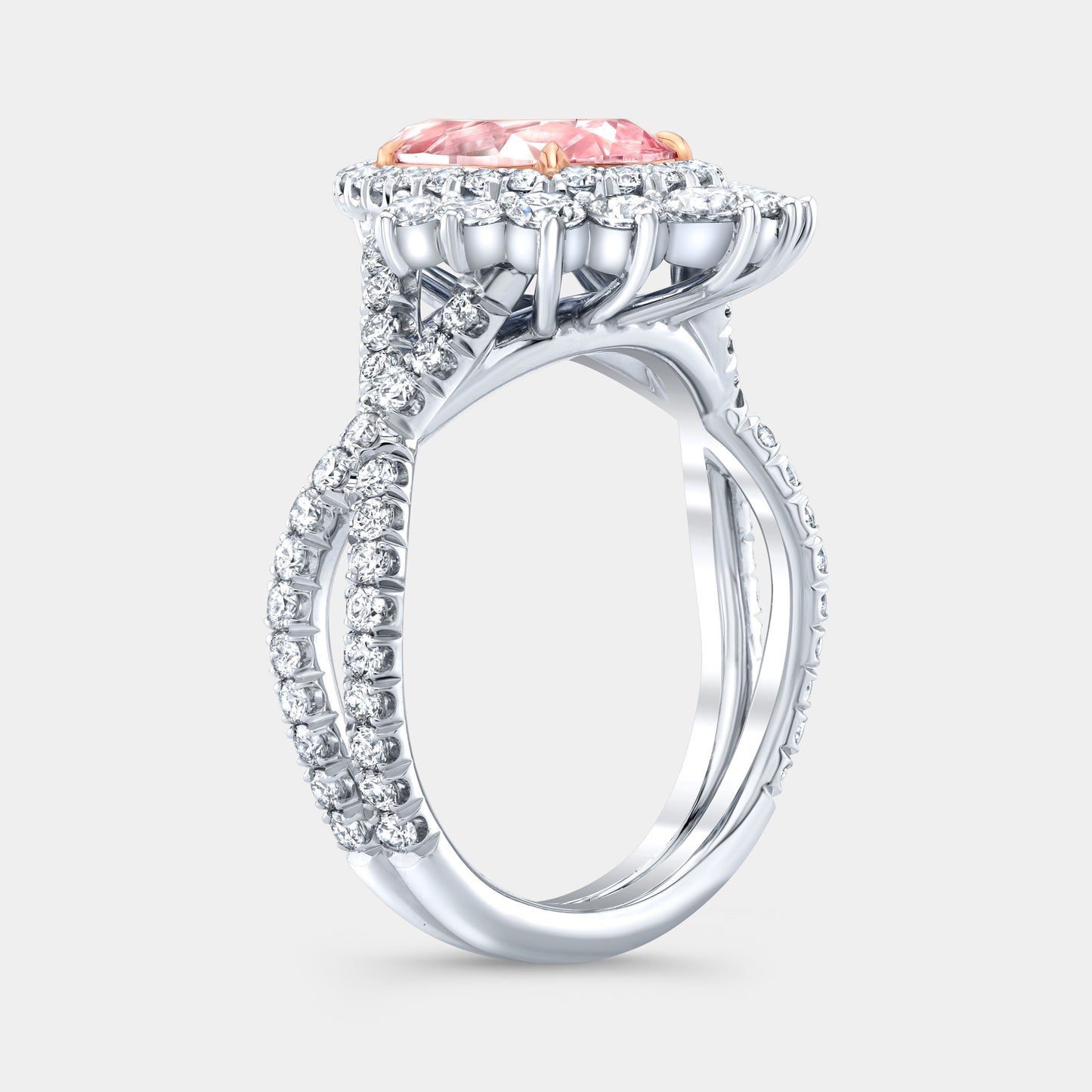 Two tone pink pear diamond ring, 45 degree, halo.