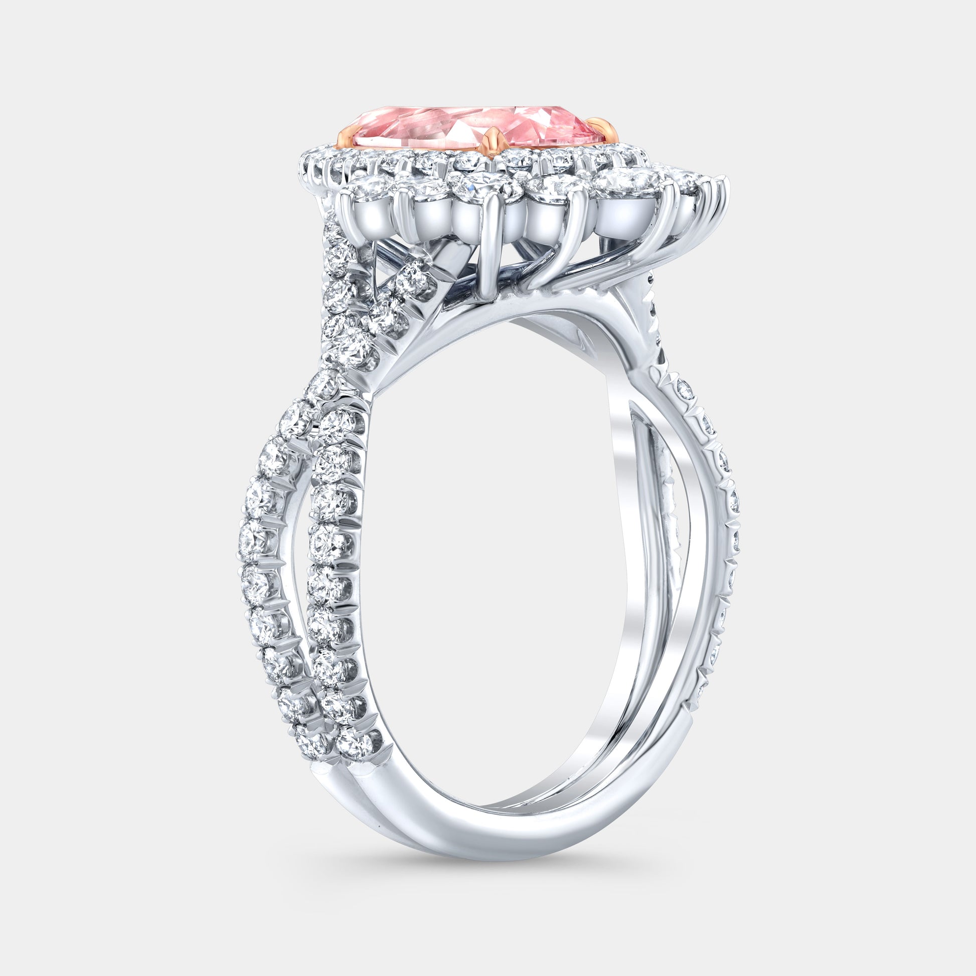 Two tone pink pear diamond ring, 45 degree, halo.