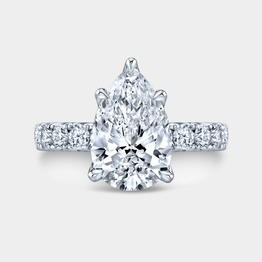 Pear diamond halo ring, white gold band.