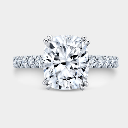 Cushion diamond halo ring, white gold band.